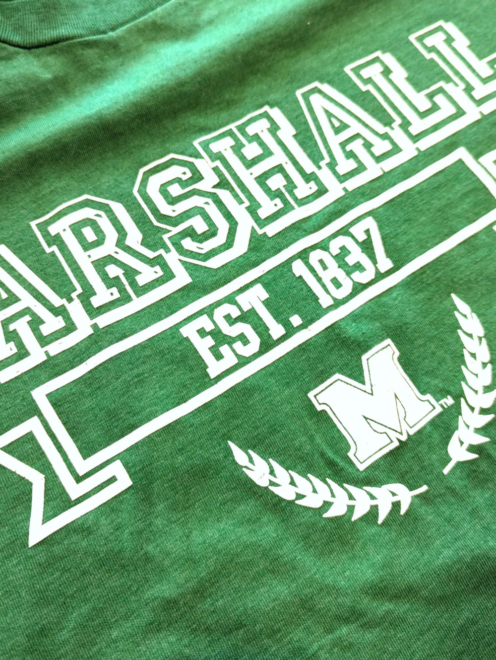 close up of the print on the marshall prep tee shirt