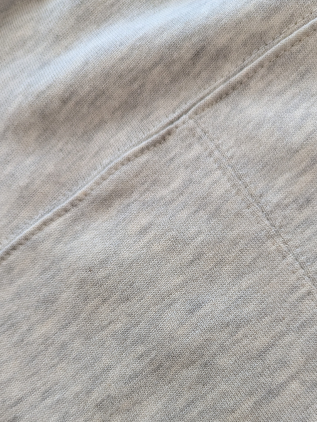 detail shot of the seaming  on  the back of the superstart sweatshirt