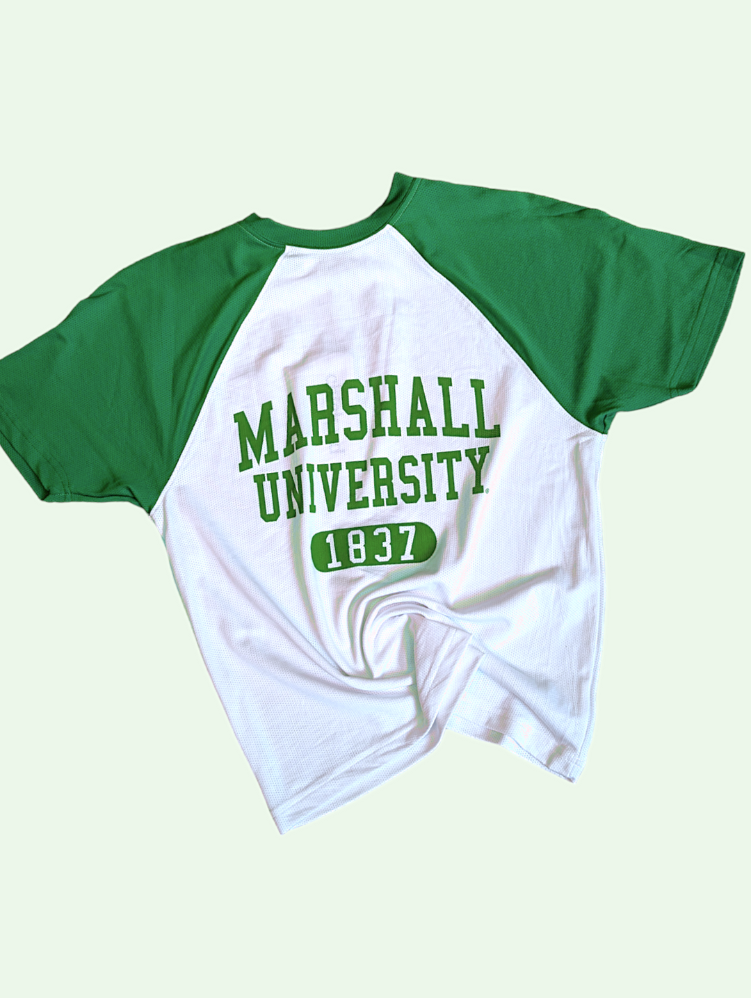 flatlay of the marshall u throwback jersey tee