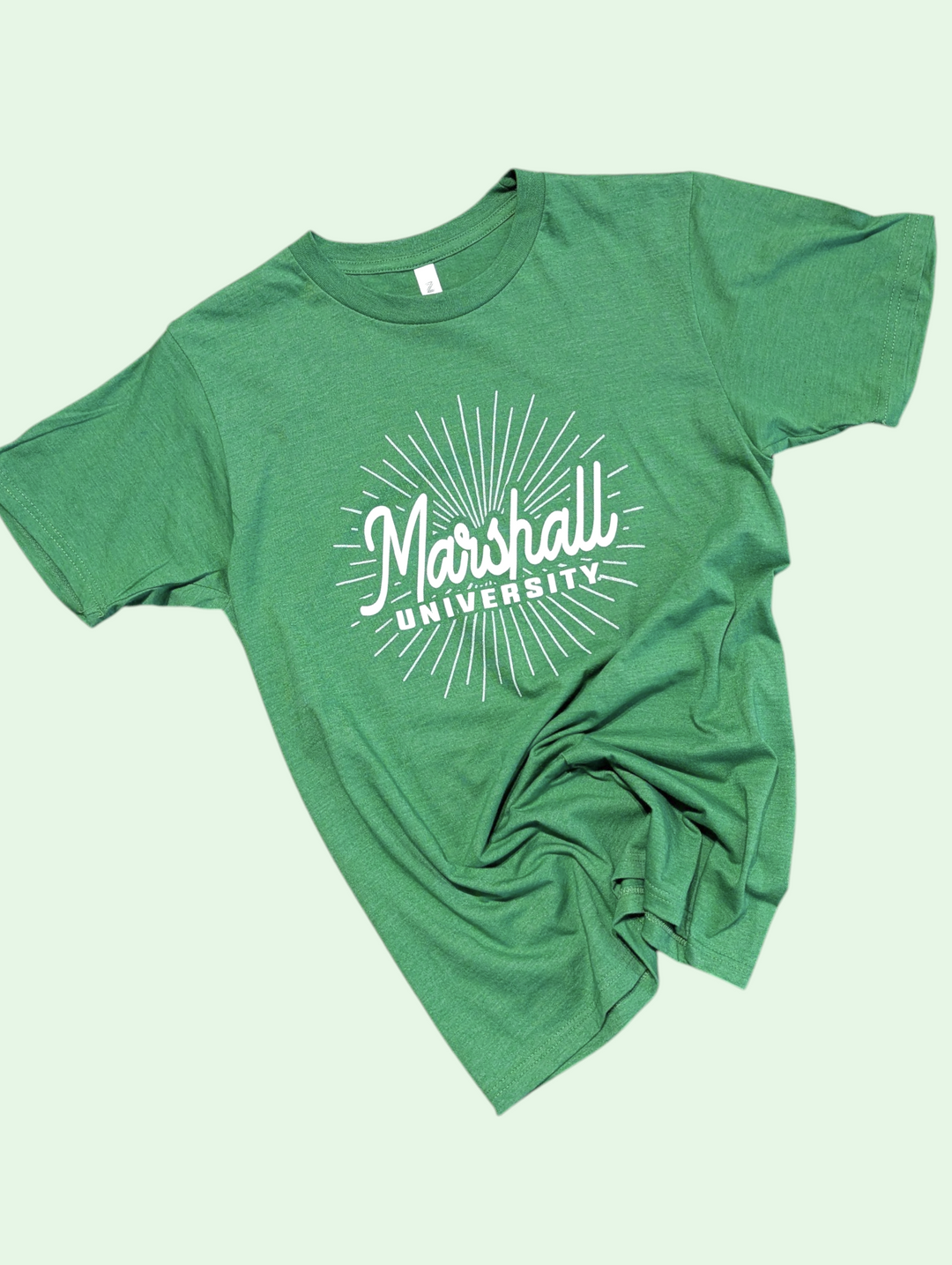 Green t-shirt with 'Marshall University' print on a light green background