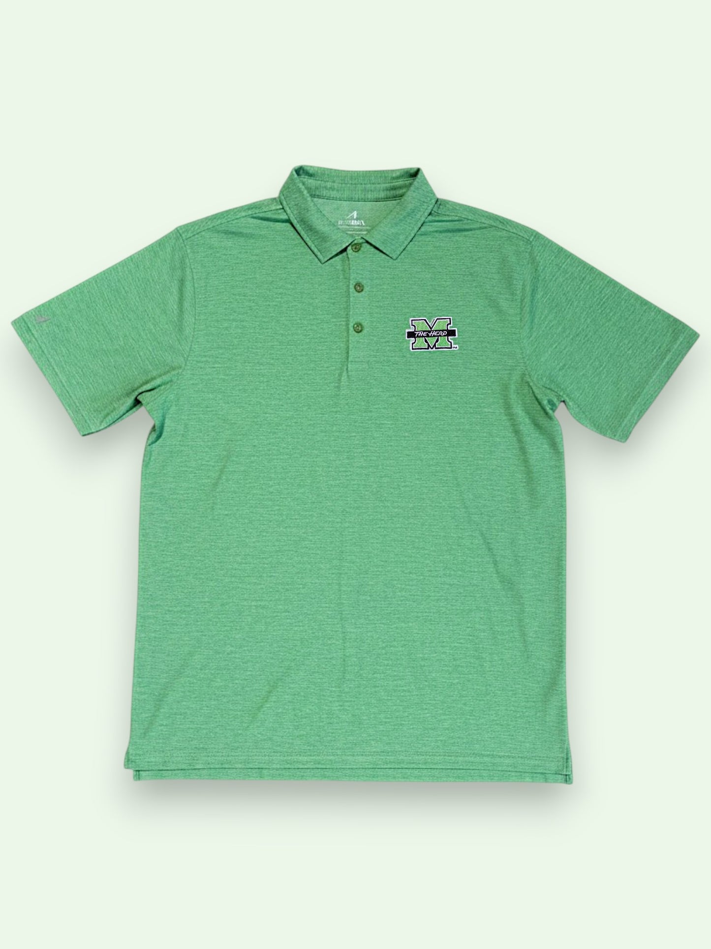 Green polo shirt with a logo on a light gray background