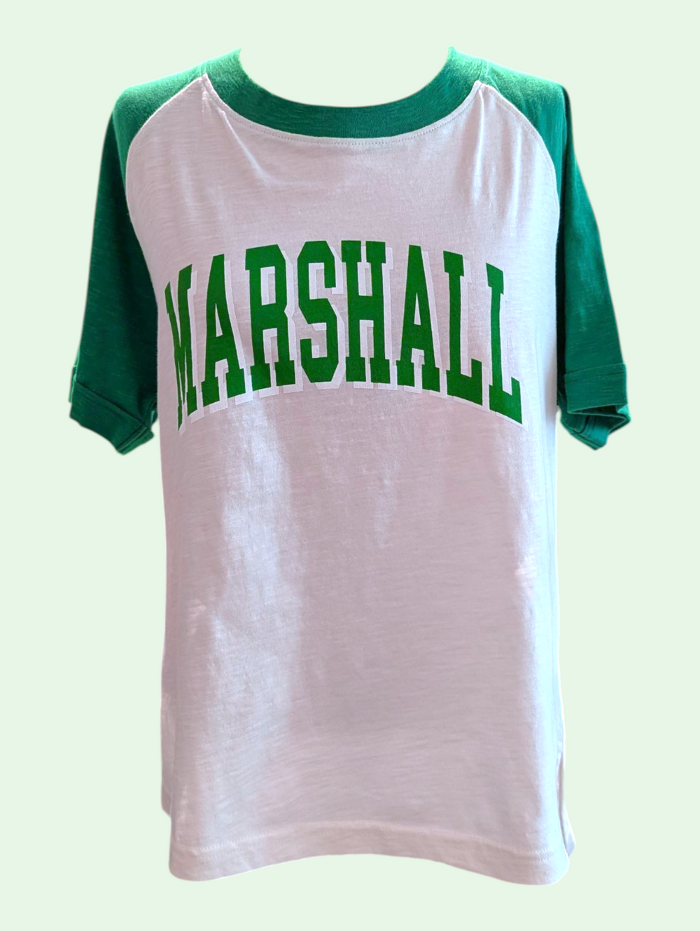 White t-shirt with green sleeves and 'MARSHALL' text on a light gray background