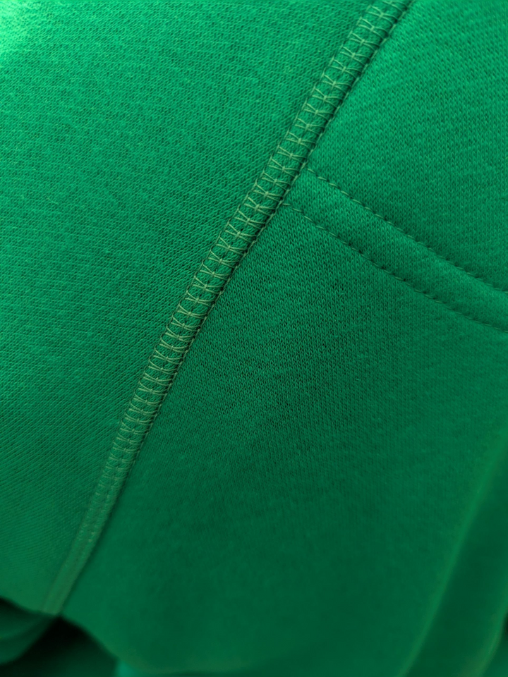 close up of the outer stitching on the sweatshirt