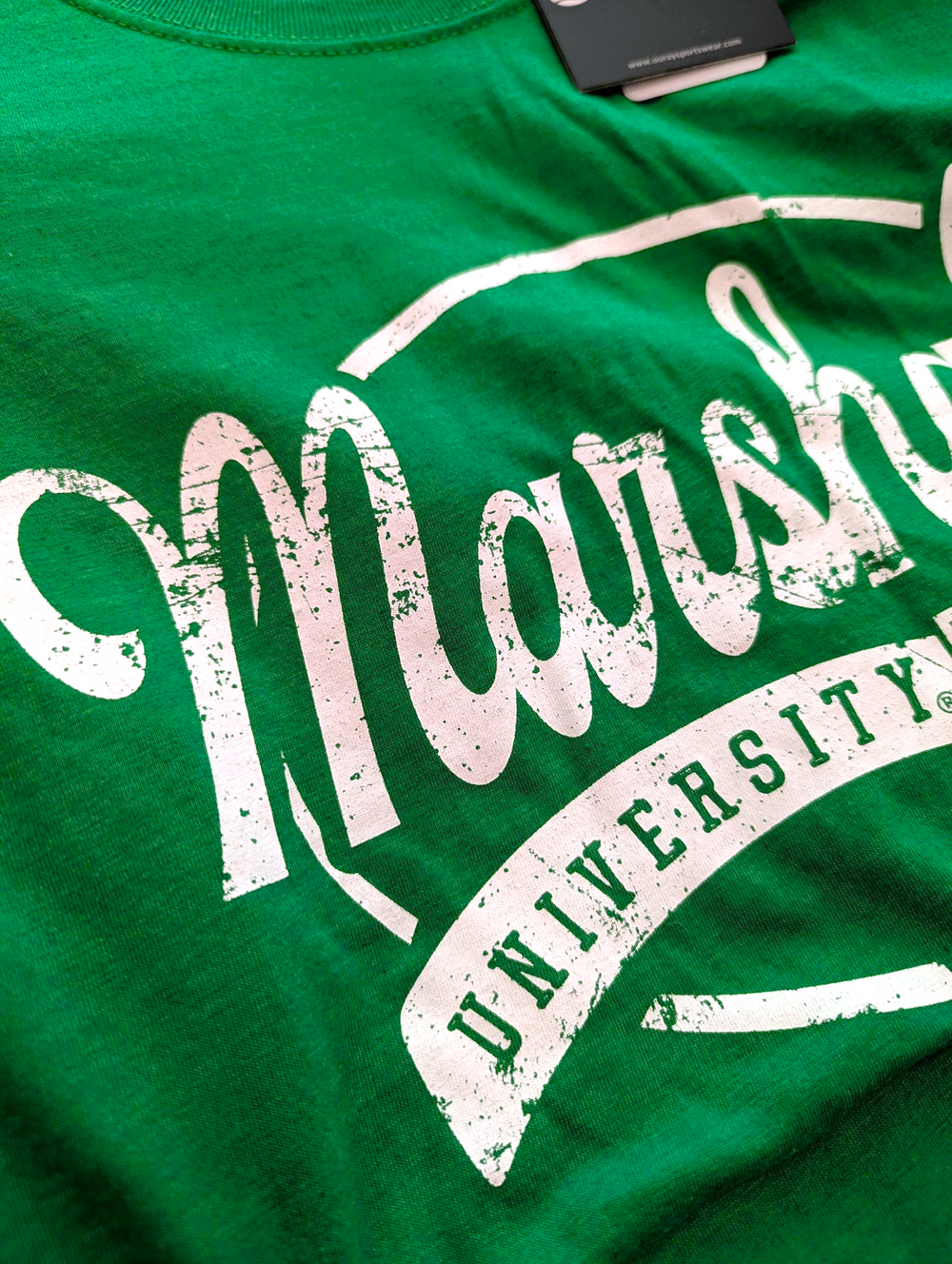 Green t-shirt with 'Marshall University' printed in white.