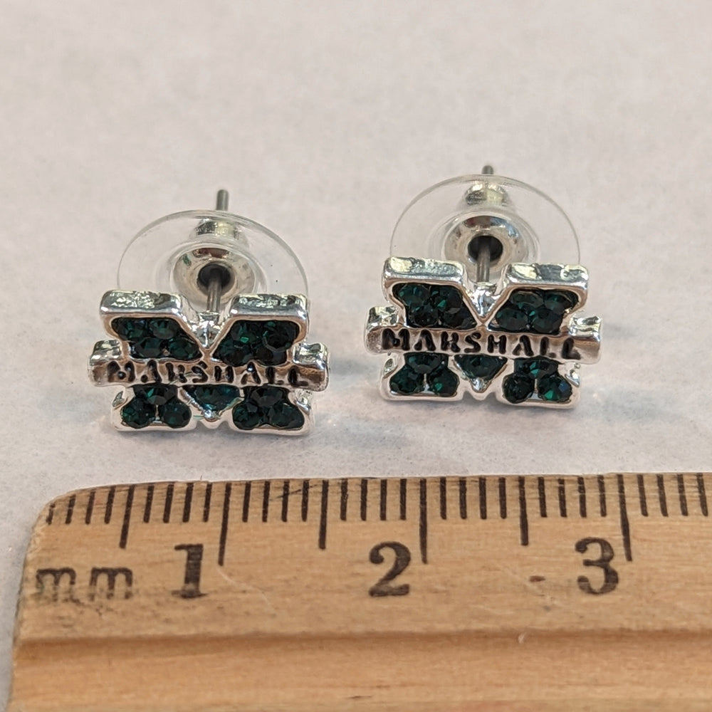 mini marshall stud earrings sitting with a ruler that show them each being about 1 centimeter wide each