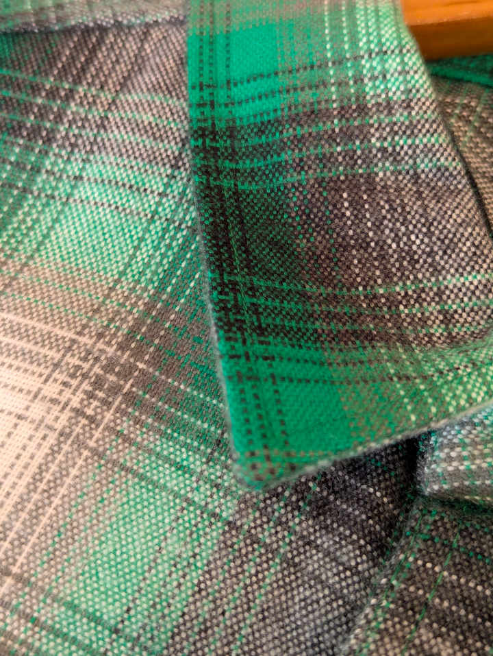 Close-up of green and brown checkered fabric