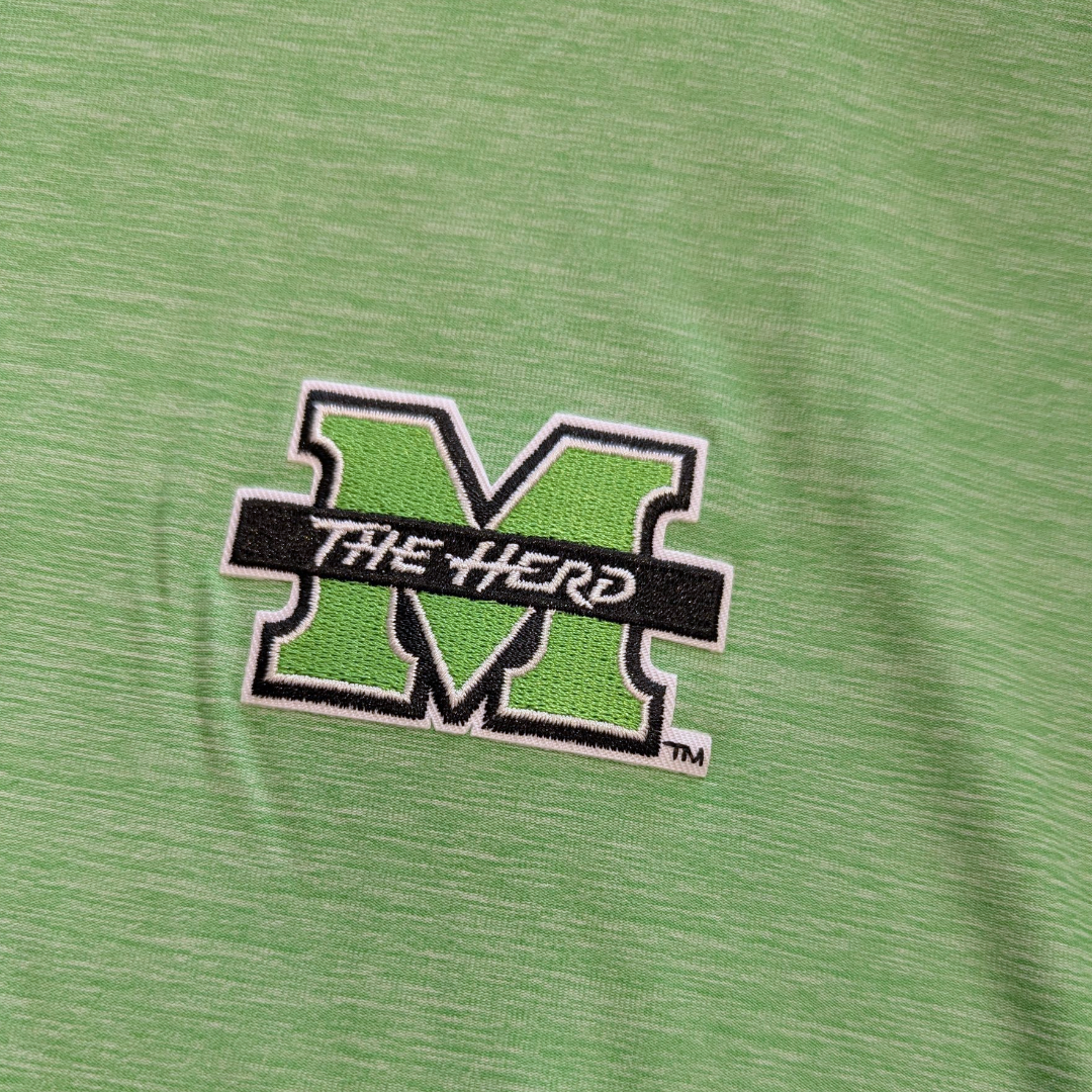 Green fabric with 'The Herd' logo embroidered on it