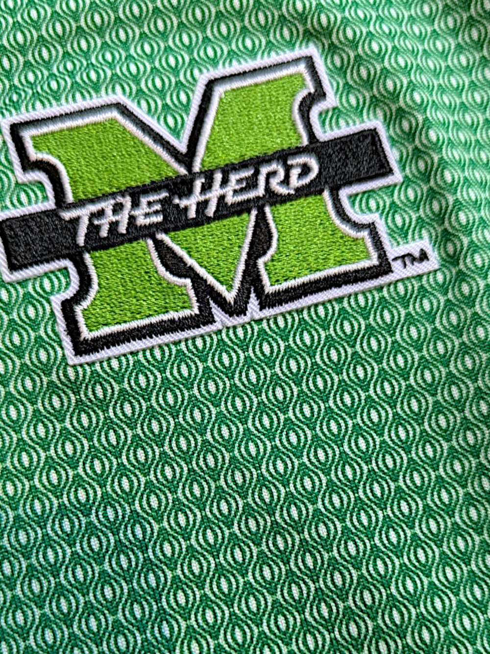 detail shot of the marshall herd logo