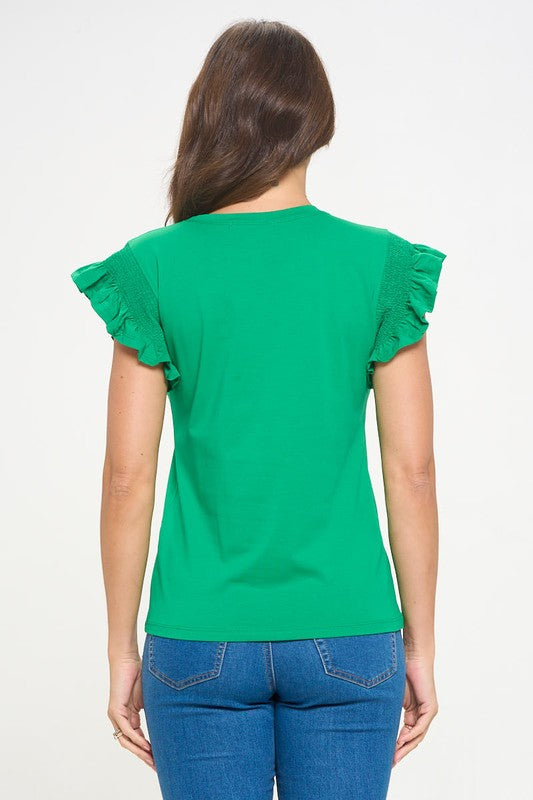 a model shows us the back of the tee shirt