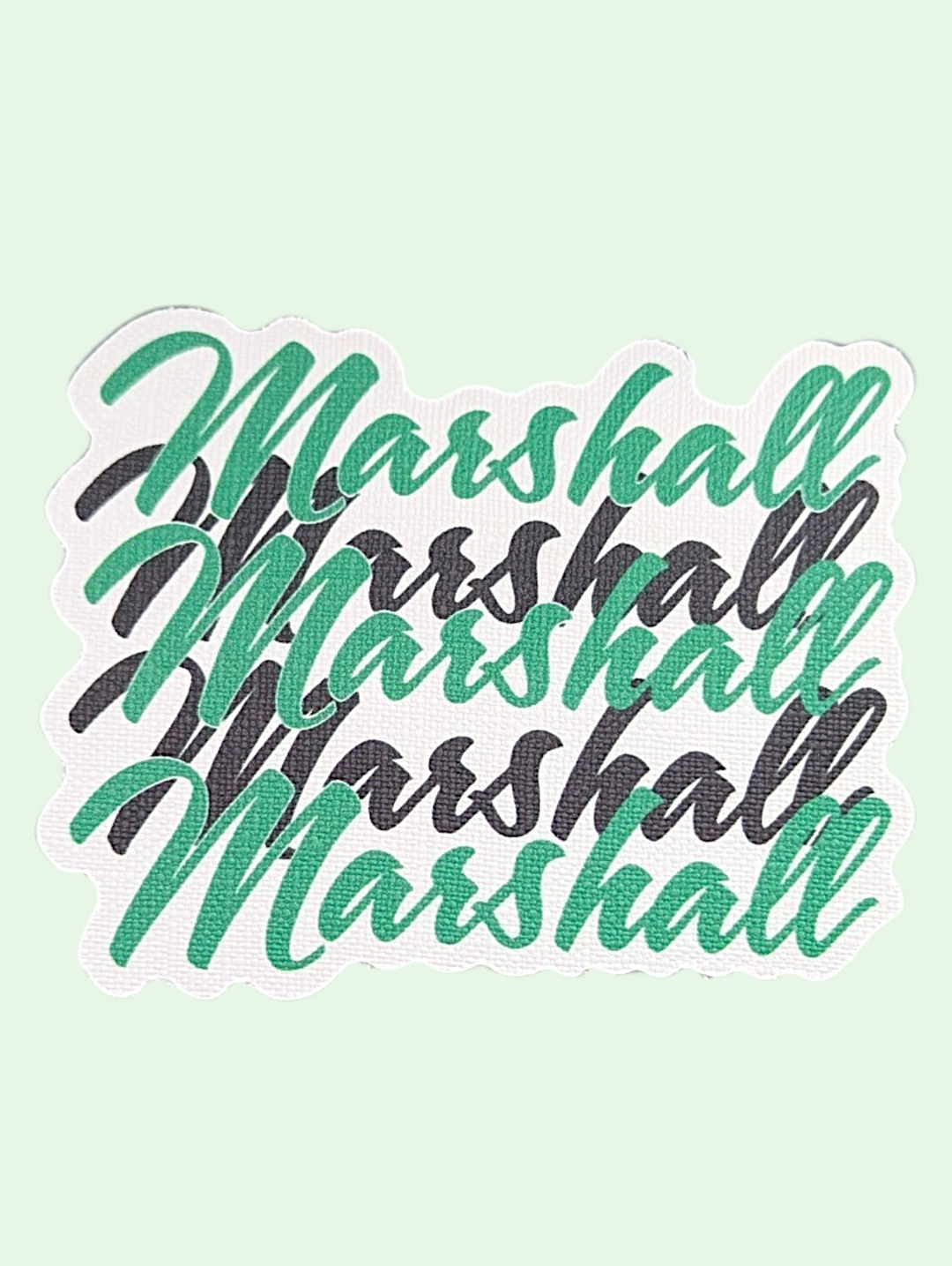 Repeating 'Marshall' text in different styles on a light green background
