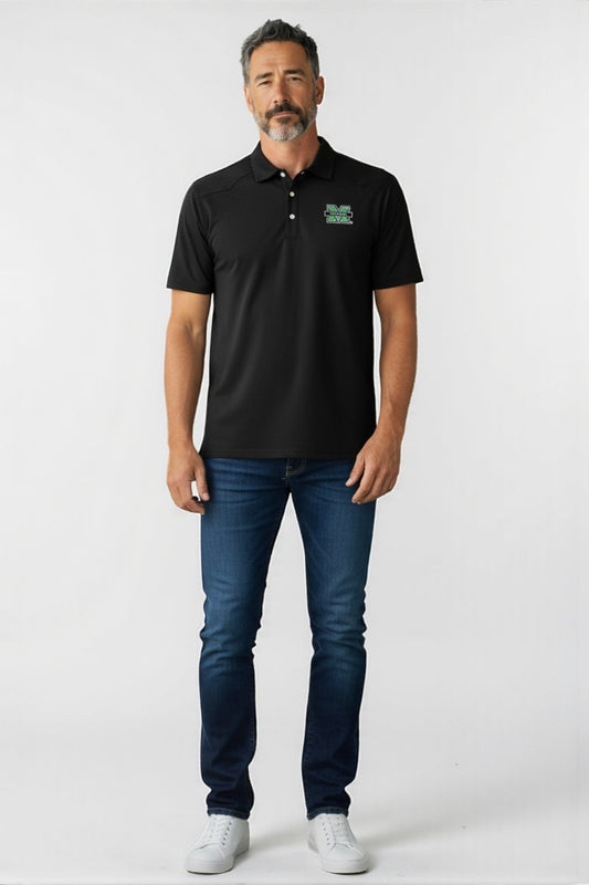 Man wearing a black polo shirt with a logo and blue jeans on a white background