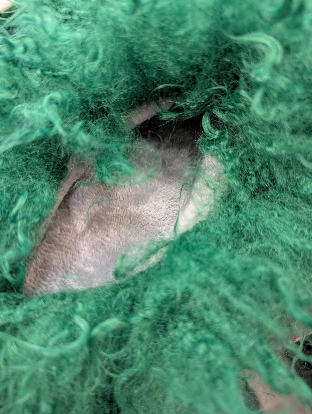 Close-up of the grey interior of the super fuzzy slipper