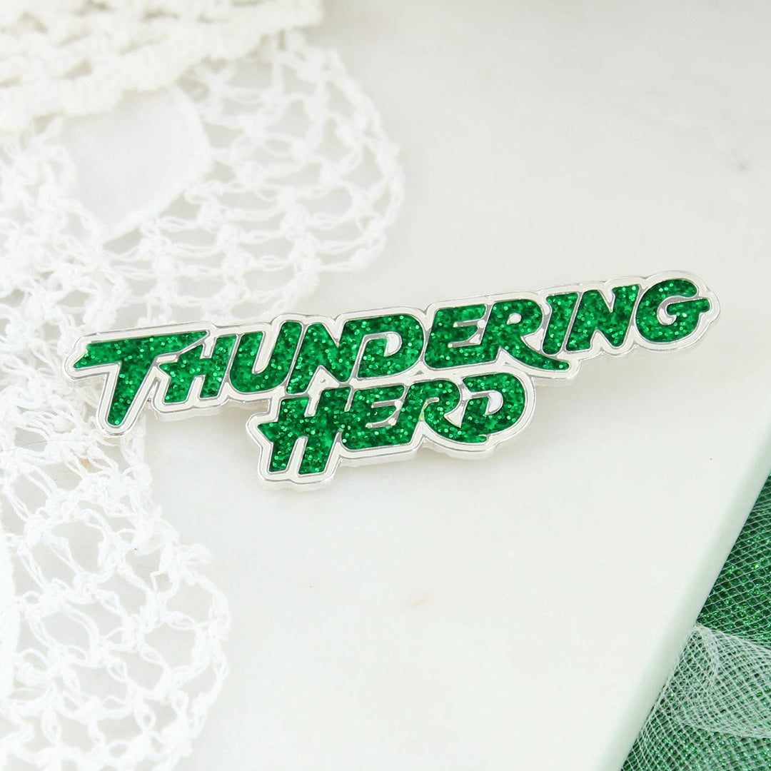 studio shot of the thundering herd lapel pin