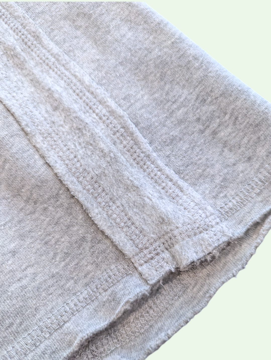 detail shot of the edge of the fleece travel pant