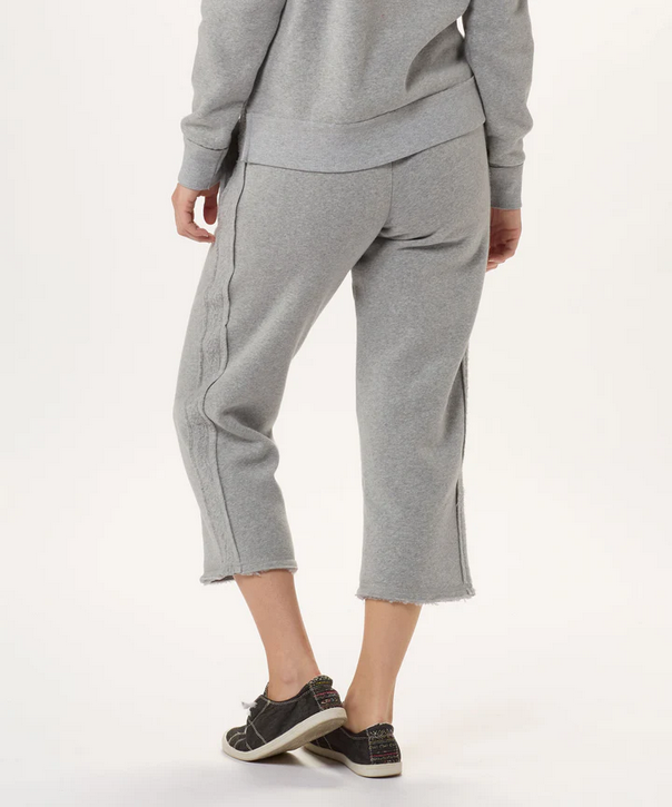 rear shot of the fleece travel pant on a model