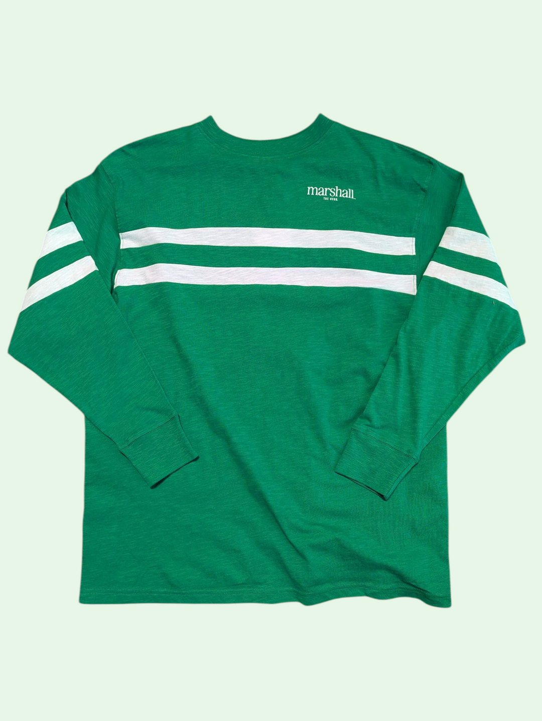 Green long-sleeve shirt with white stripes on a light green background