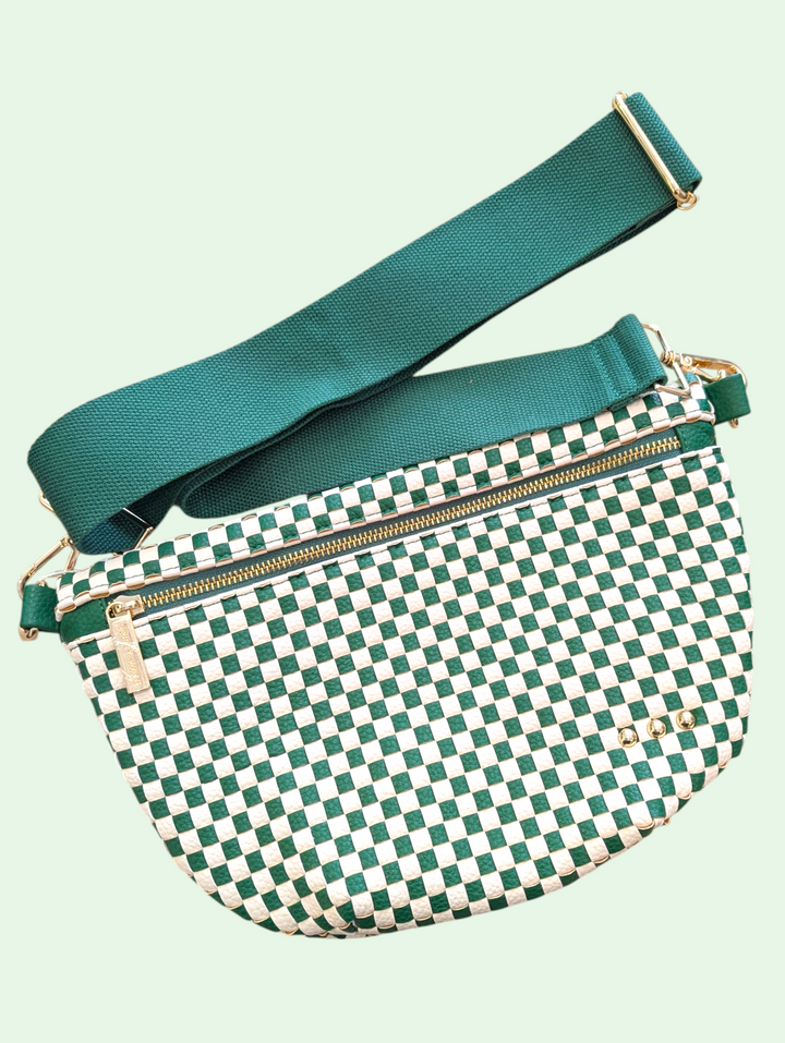 Green and white checkered bag with a green strap on a light green background