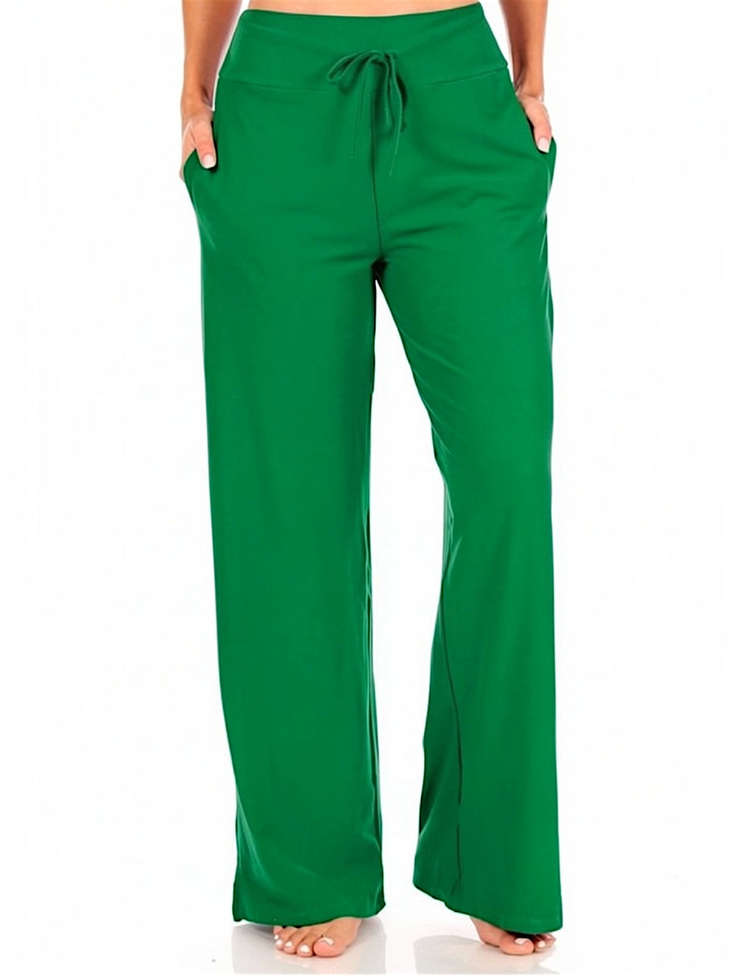 Green wide-leg pants worn by a person on a white background