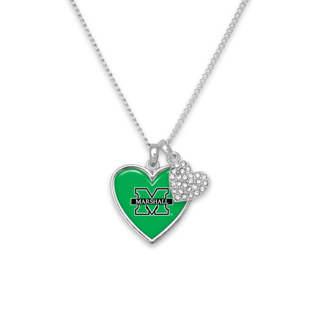 the heart necklace is shown with the larger green heart with the marshall block M logo in the center and the smaller clear rhinestone heart next to it